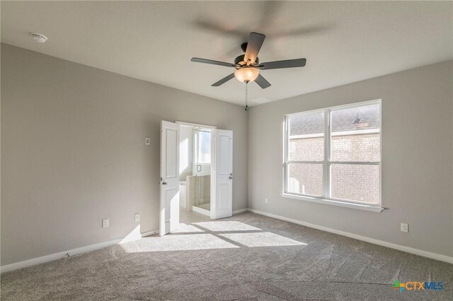 bathroom featuring tile patterned flooring, vanity, and walk in shower