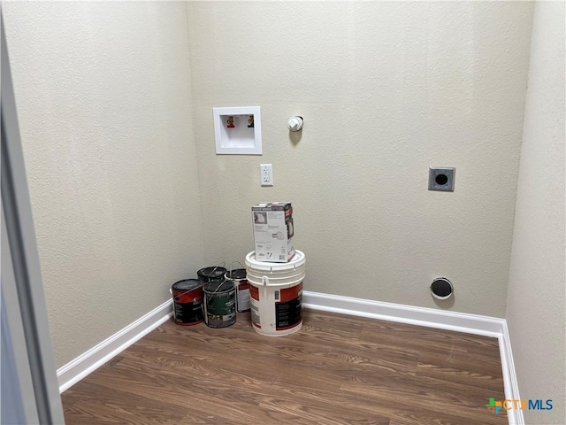 710 E 5th St, Nixon, TX 78140 - laundry room with electric dryer hookup, wood finished floors, hookup for a washing machine, and hookup for a gas dryer