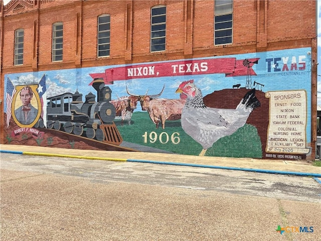 710 E 5th St, Nixon, TX 78140 - exterior view of brick siding