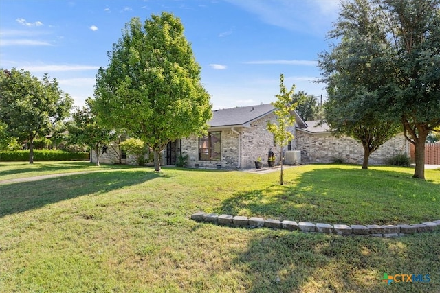 view of front of house with a front yard