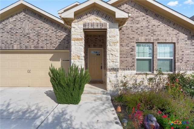 entrance to property with a garage