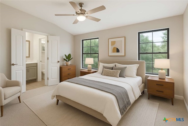 9538 Beau Brg, San Antonio, TX 78254 - bedroom with vaulted ceiling, multiple windows, ensuite bathroom, and ceiling fan