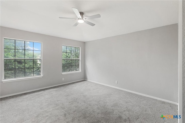 9538 Beau Brg, San Antonio, TX 78254 - carpeted spare room featuring a ceiling fan and baseboards