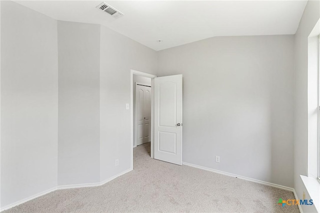 9538 Beau Brg, San Antonio, TX 78254 - carpeted empty room featuring baseboards and vaulted ceiling