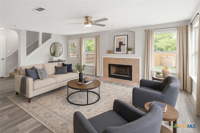 9538 Beau Brg, San Antonio, TX 78254 - living room with light wood-style floors, ceiling fan, plenty of natural light, and recessed lighting