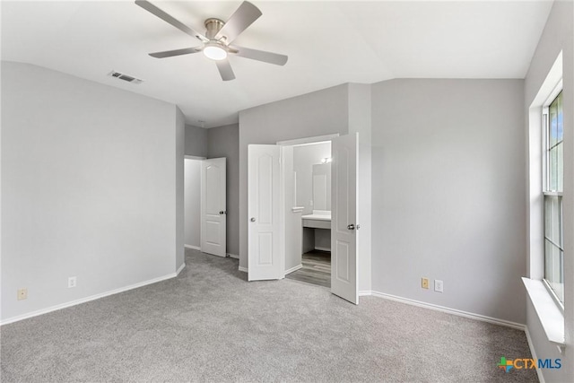 9538 Beau Brg, San Antonio, TX 78254 - unfurnished bedroom featuring carpet flooring, lofted ceiling, ensuite bathroom, and ceiling fan