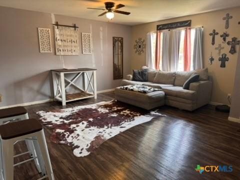 117 Clydesdale Ln, Victoria, TX 77904 - living room with baseboards, ceiling fan, and wood finished floors