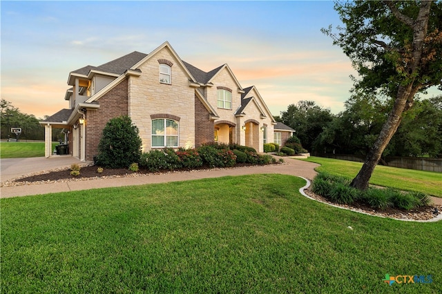 view of front of home with a yard