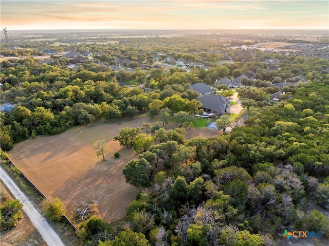 view of aerial view at dusk