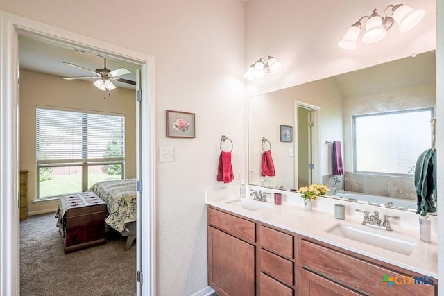 5821 Worthing Dr, Temple, TX 76502 - ensuite bathroom featuring double vanity, a ceiling fan, and a garden tub