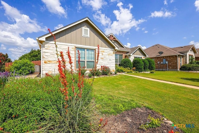 5821 Worthing Dr, Temple, TX 76502 - view of front of house with stone siding and board and batten siding