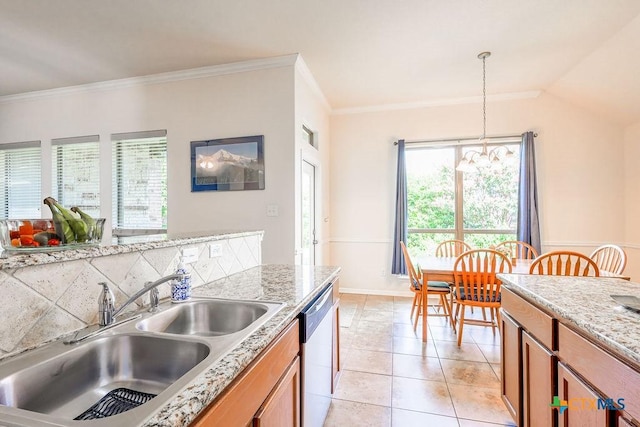 5821 Worthing Dr, Temple, TX 76502 - kitchen featuring stainless steel dishwasher, a chandelier, ornamental molding, brown cabinets, and light tile patterned flooring