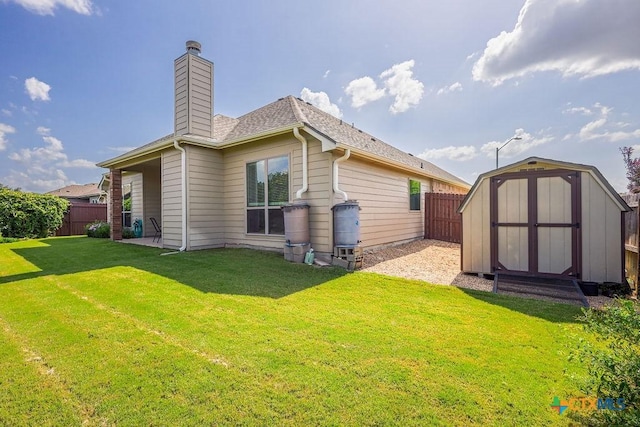 5821 Worthing Dr, Temple, TX 76502 - rear view of house featuring a shed, a fenced backyard, and a chimney