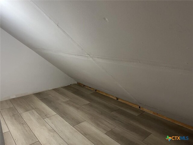 114 N Andrews Dr, Robinson, TX 76706 - additional living space with wood finished floors and lofted ceiling