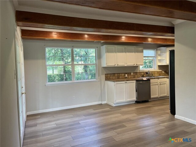 114 N Andrews Dr, Robinson, TX 76706 - kitchen with white cabinets, stainless steel dishwasher, and beamed ceiling