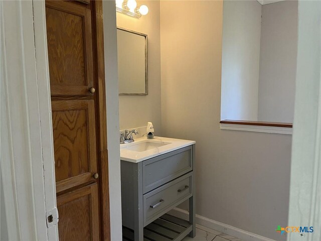 114 N Andrews Dr, Robinson, TX 76706 - bathroom featuring baseboards and vanity