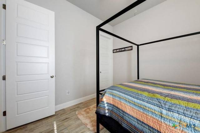 bedroom featuring light hardwood / wood-style floors