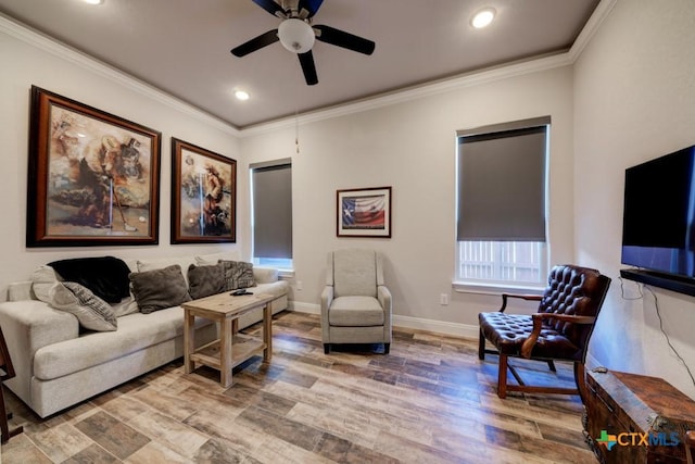 living room featuring crown molding, hardwood / wood-style floors, and ceiling fan