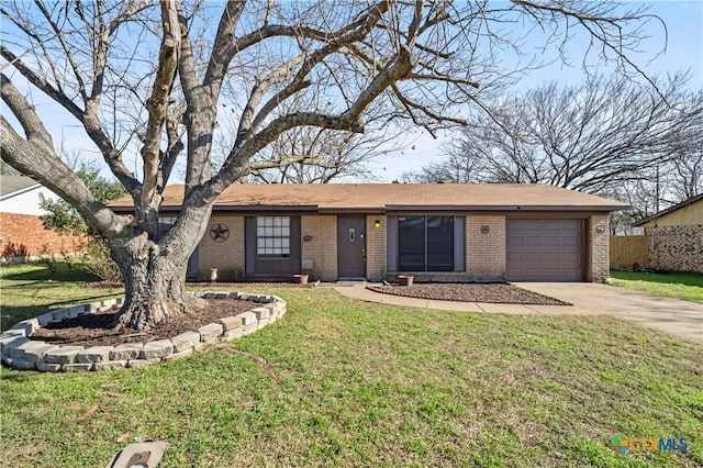 ranch-style house featuring a garage and a front yard