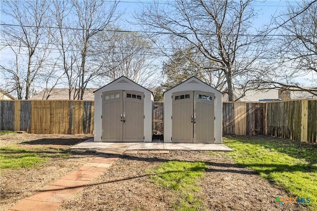 view of outbuilding featuring a lawn