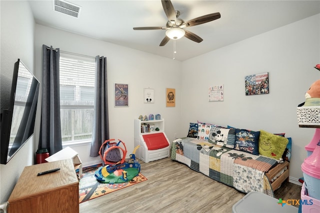 19500 Chayton Cir, Pflugerville, TX 78660 - game room featuring healthy amount of natural light, a ceiling fan, wood finished floors, and baseboards