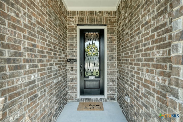 19500 Chayton Cir, Pflugerville, TX 78660 - doorway to property featuring brick siding