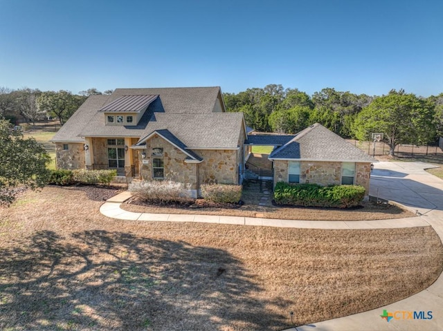 view of front of house with stone siding