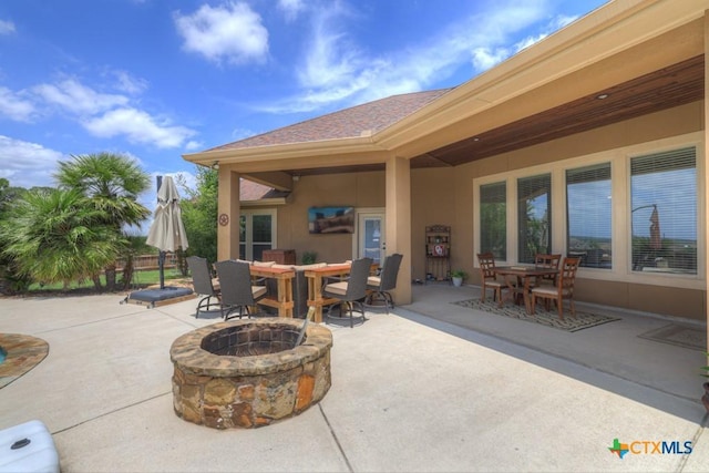 108 Westfield Vw, La Vernia, TX 78121 - view of patio with outdoor dining space and a fire pit