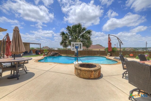 108 Westfield Vw, La Vernia, TX 78121 - view of swimming pool with a fenced backyard, a patio area, and a pool with connected hot tub