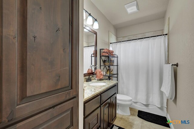 108 Westfield Vw, La Vernia, TX 78121 - full bath featuring vanity, toilet, and tile patterned floors