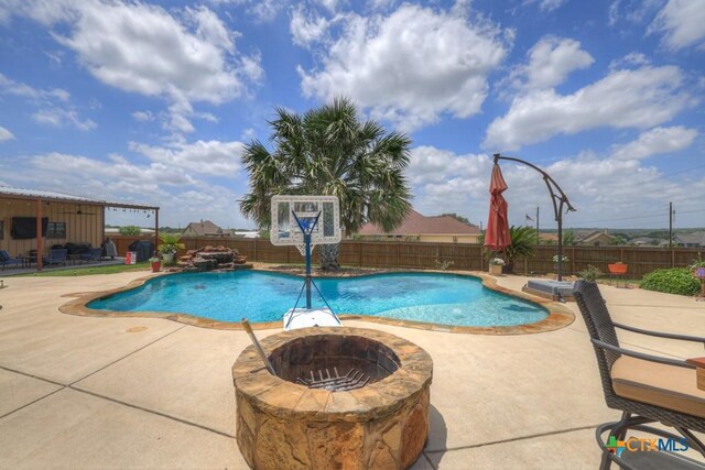 108 Westfield Vw, La Vernia, TX 78121 - view of pool featuring an outdoor fire pit, a fenced backyard, a patio, and a pool with connected hot tub