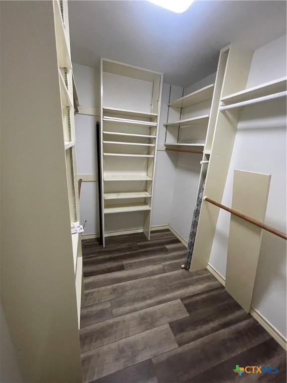 1505 E Park Ave, Victoria, TX 77901 - walk in closet with wood finished floors