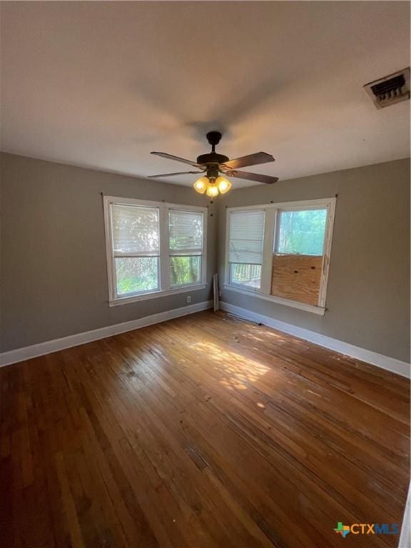 1505 E Park Ave, Victoria, TX 77901 - unfurnished room with wood-type flooring and a ceiling fan