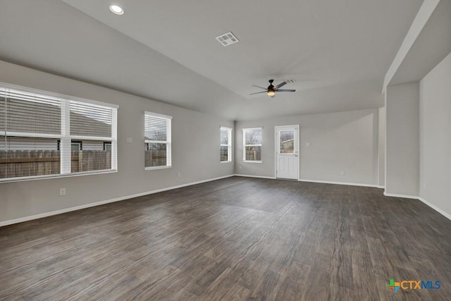 unfurnished living room with vaulted ceiling, dark hardwood / wood-style floors, and ceiling fan