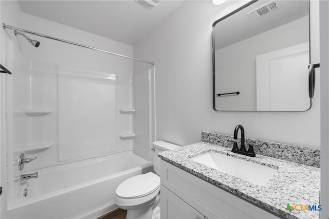 bathroom featuring toilet, visible vents,  shower combination, and vanity