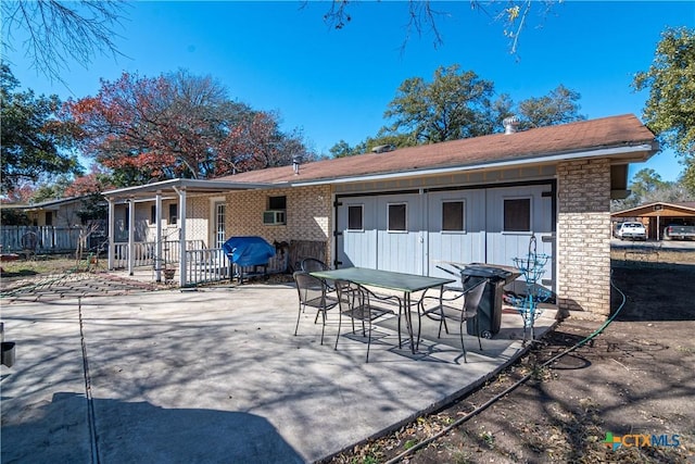 rear view of house featuring a patio area