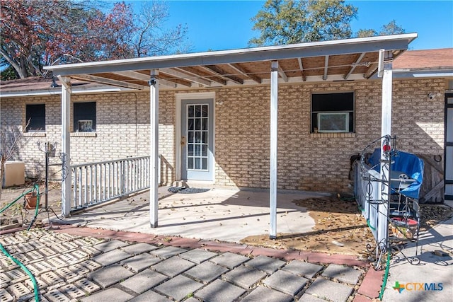 back of house with a patio