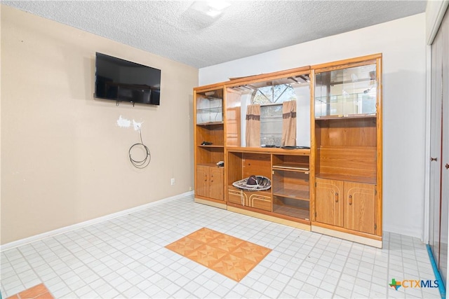 living room with a textured ceiling