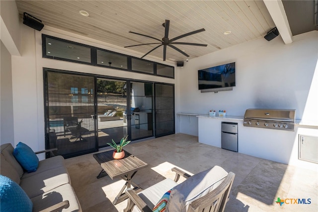 view of patio featuring ceiling fan and area for grilling