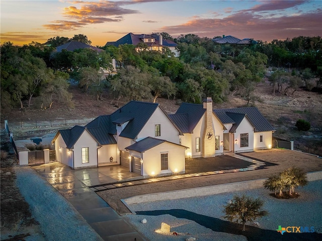 view of aerial view at dusk