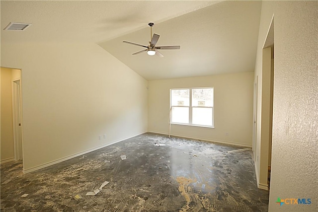 spare room with vaulted ceiling and ceiling fan