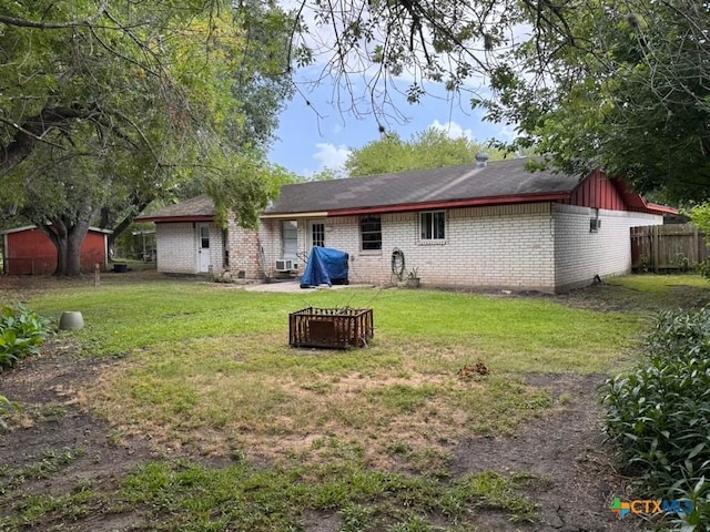 2708 E Poplar Ave, Victoria, TX 77901 - rear view of property featuring brick siding