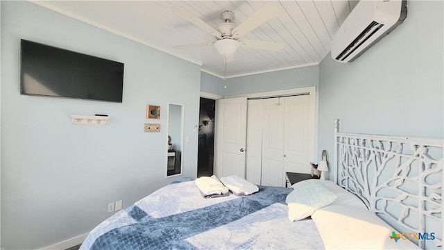 1265 N Ocean Dr Unit 2, Port Lavaca, TX 77979 - bedroom with a ceiling fan, a closet, a wall unit AC, and crown molding