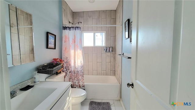 1265 N Ocean Dr Unit 2, Port Lavaca, TX 77979 - bathroom with shower / tub combo, vanity, tile patterned flooring, and toilet