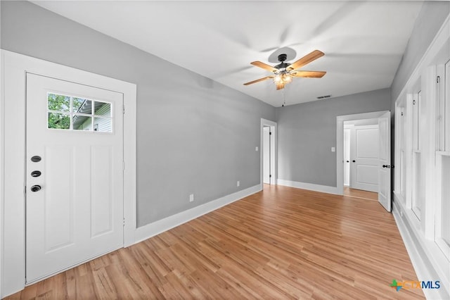 foyer entrance featuring ceiling fan and light hardwood / wood-style floors