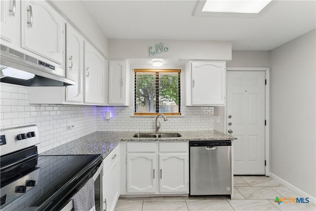 226 Gruene Rd, New Braunfels, TX 78130 - kitchen with white cabinets, decorative backsplash, stainless steel appliances, and a sink