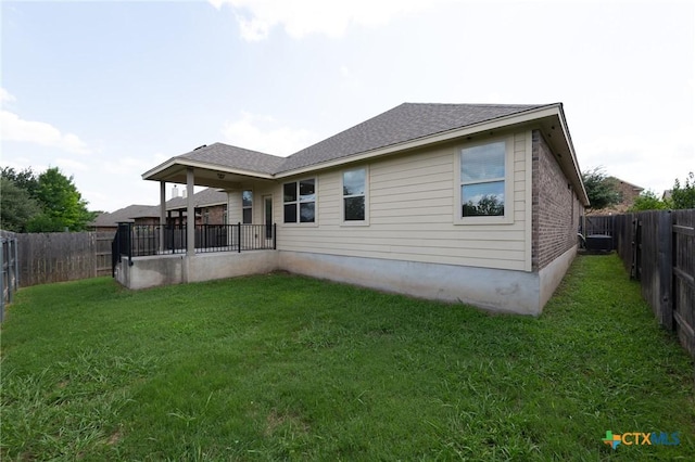 9505 Alex Ln, Austin, TX 78748 - back of house featuring a fenced backyard and a shingled roof