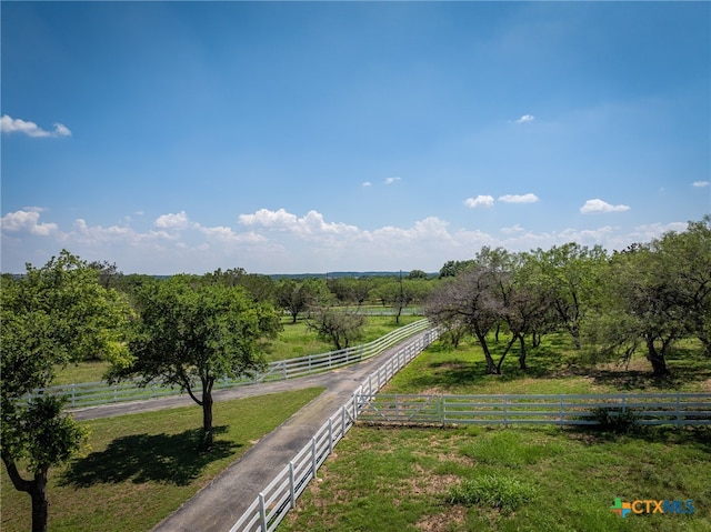 view of community with a rural view