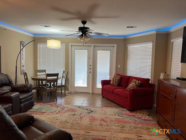 730 E Mather St Unit K203, New Braunfels, TX 78130 - living room featuring a ceiling fan, tile patterned flooring, and ornamental molding