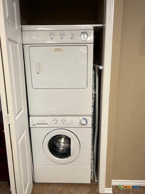 730 E Mather St Unit K203, New Braunfels, TX 78130 - washroom featuring stacked washer and clothes dryer